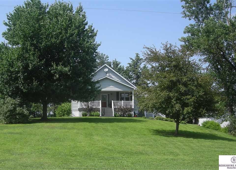 Ranch home sits on one acre on a secluded lot.