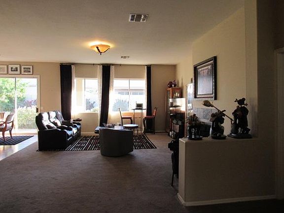 Large foyer with fireplace in living room