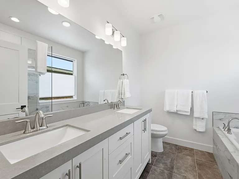 Master bathroom with his and hers sinks