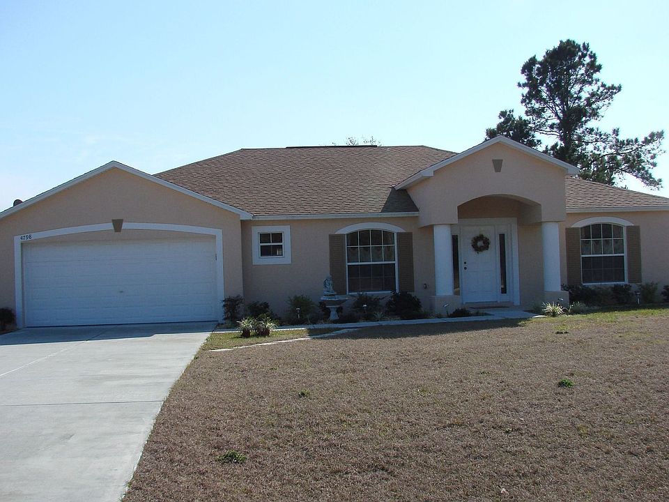 Beautiful front; covered entry