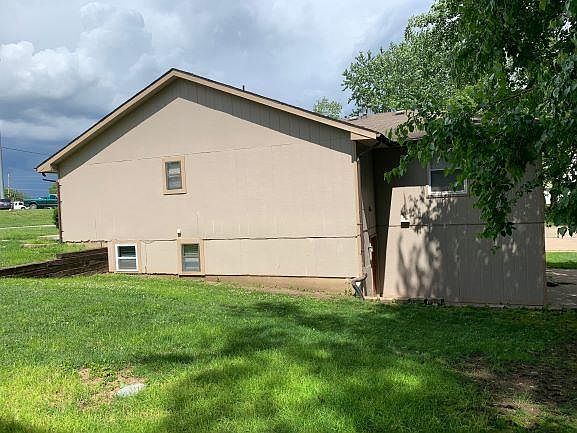 View of duplex from east