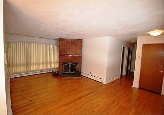 Living Room with Wood Burning FP