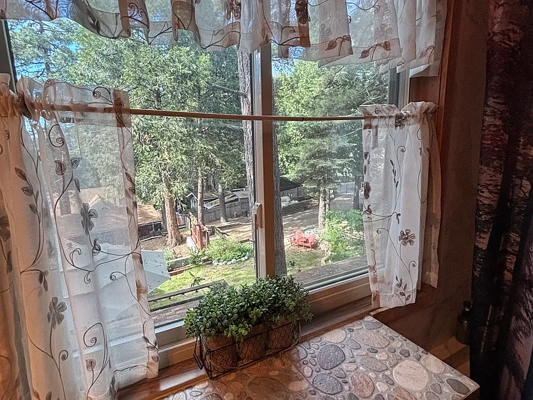 The bathroom has a beautiful view