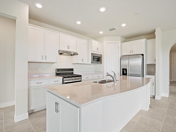 New Home with white cabinets and quartz countertops