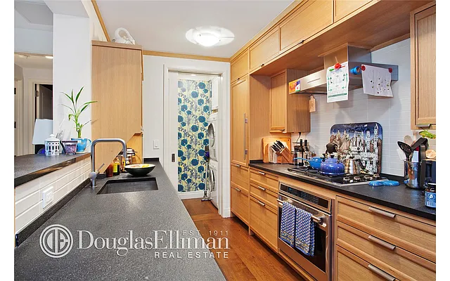 Sold by Douglas Elliman | media 12