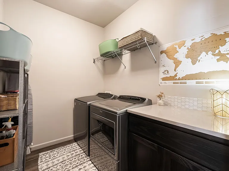Full laundry room & cleaning supplies needed.