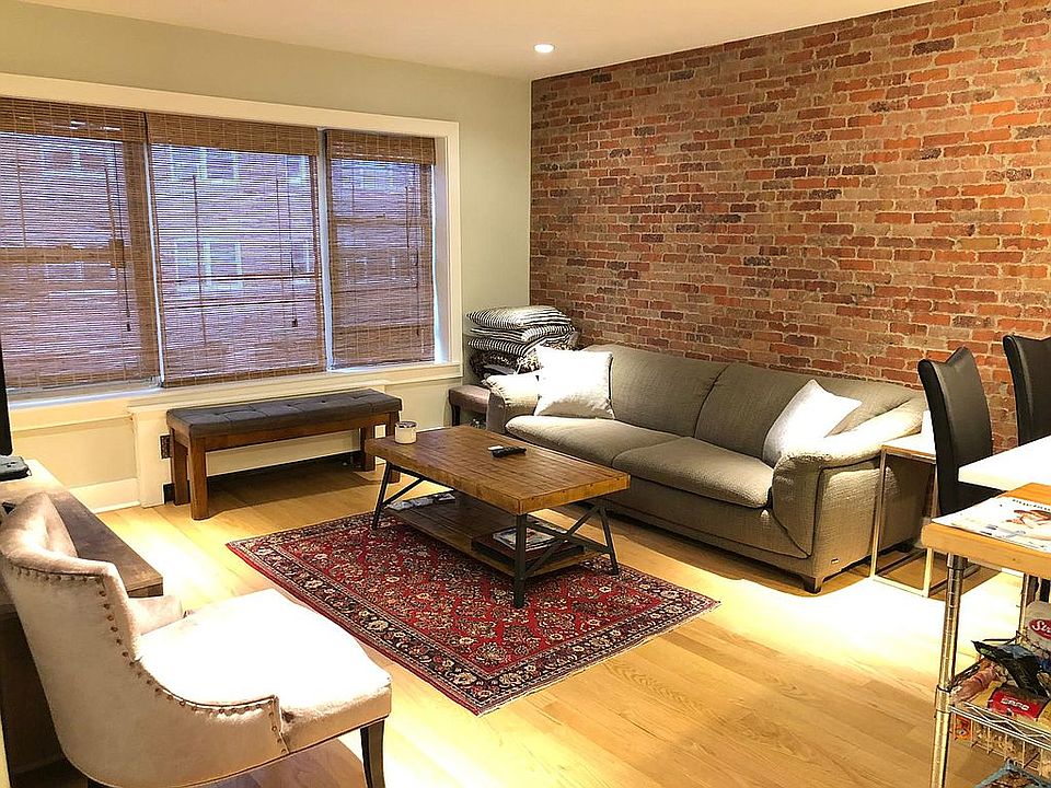 Living Area with Brick Wall