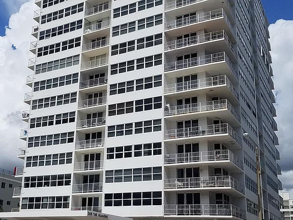 The exterior of the building. Just steps away from the sand