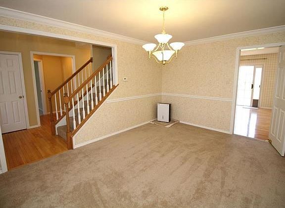 Former Hayden display home with upgraded trim and crown molding.
