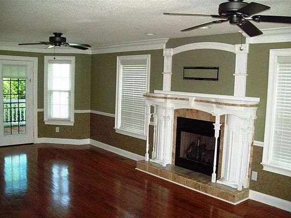 Living room w/ walkout patio