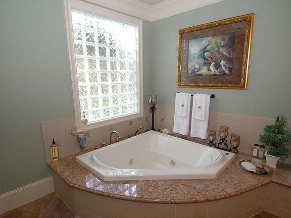  THE HUGE MASTER BATH HAS AN OVERSIZED SPA!