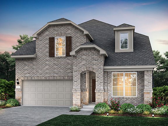 The Riverdale, a two-story home with 2-car garage, shown as Home Exterior B