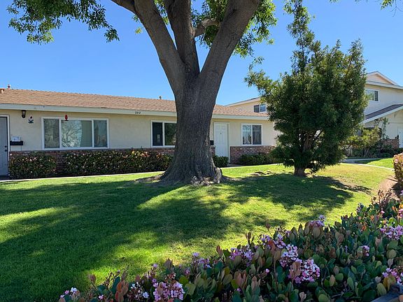 Front of duplex located on a quiet cut-de-sac street.