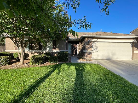 Exterior, front yard and front door entrance.