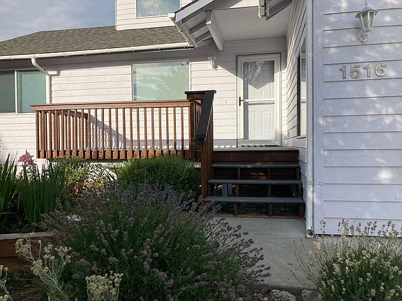 The main entrance has a screen door and a great porch for a morning coffee or watching the day go by.