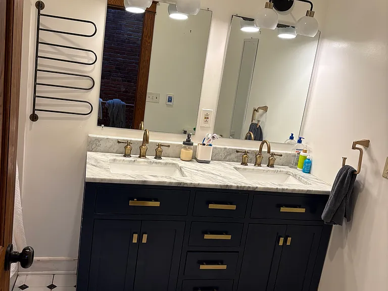 Another shot of the primary bathroom (w/ heated floors). Not pictured is the toilet, but it exists. For real.