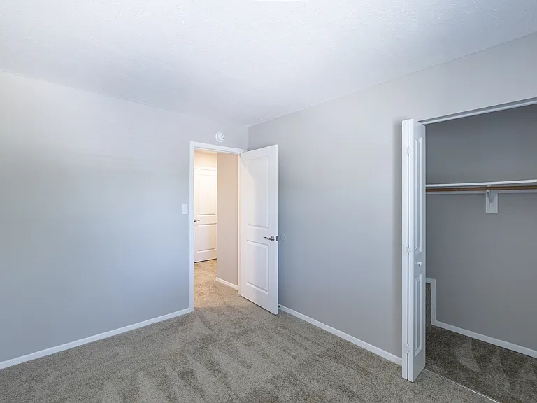 Second Bedroom in the Three Bedroom Townhome at Woodbridge Bloomington
