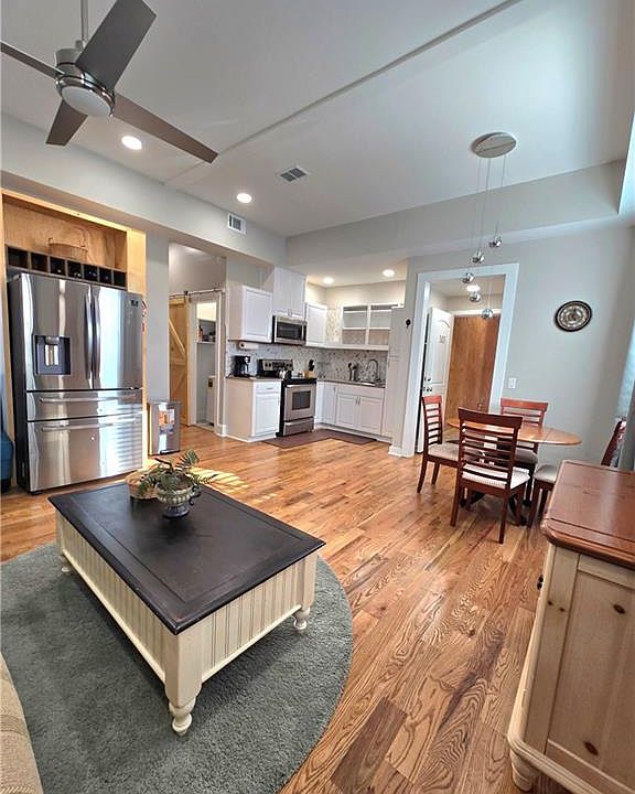 another view of living area including the fully equipped kitchen