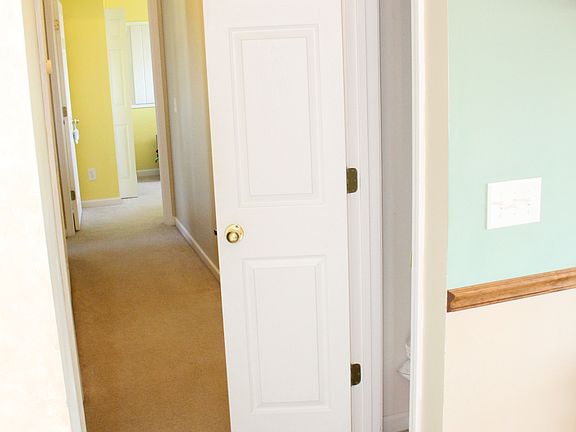 Hallway w/ linen closet