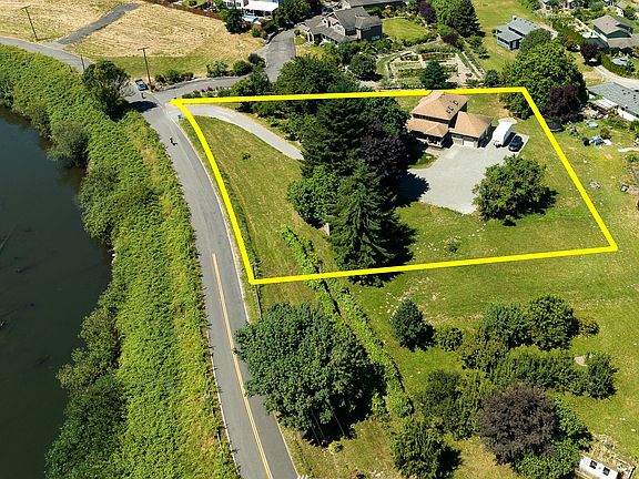 Home sits on one full acre lot. 