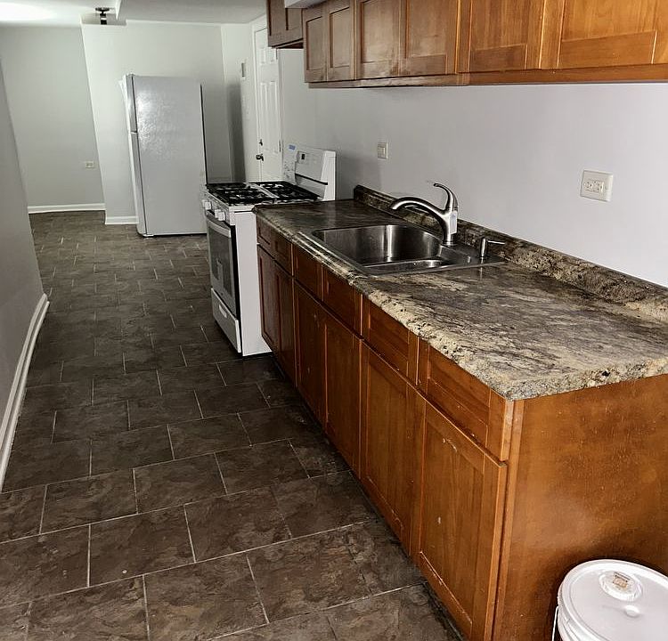 1st image of 1452 E 71st Pl #G