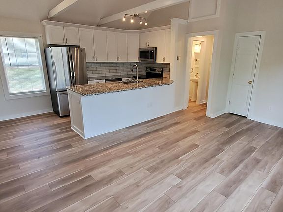 Living area to kitchen