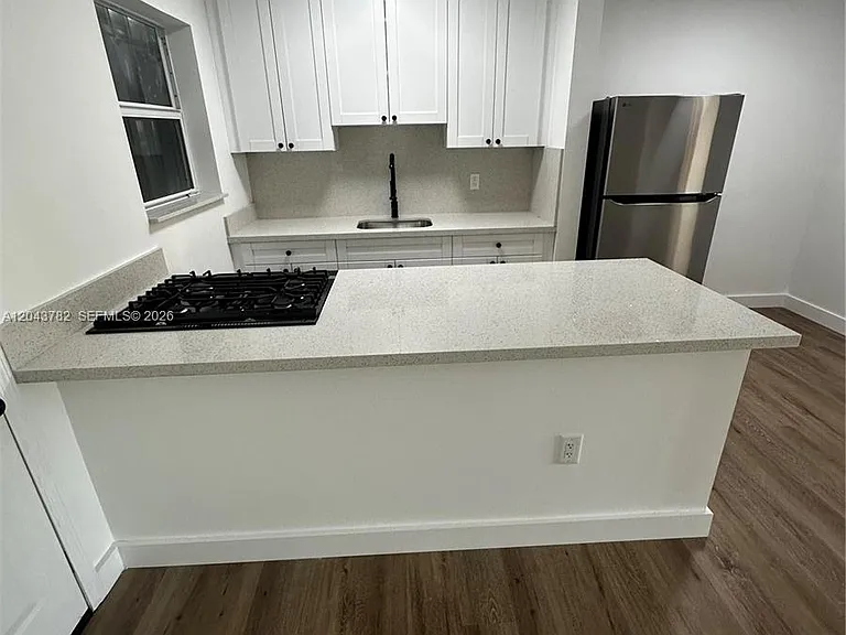 1255 W 49th Pl #E205 — Photo 5
