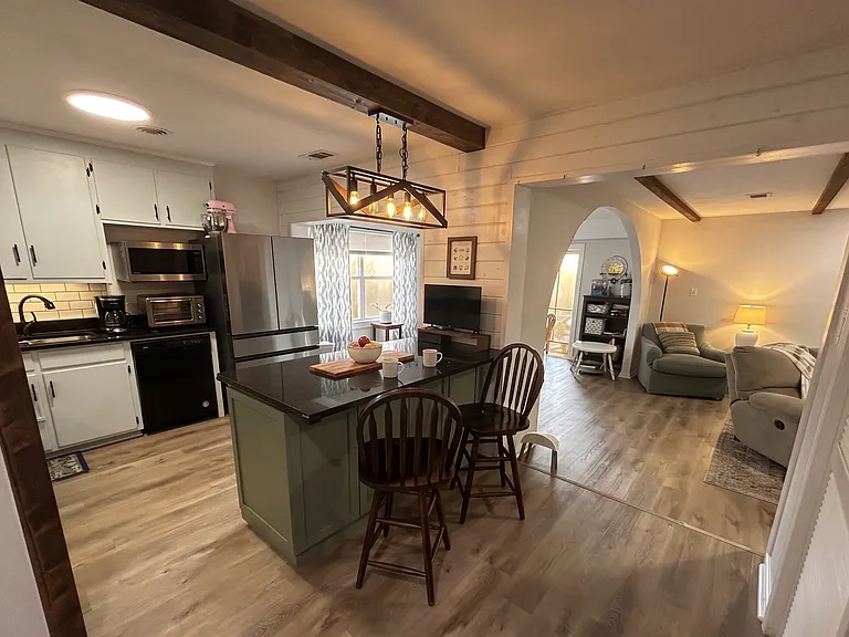 Kitchen Opens to Dining Room and Living Room (Pantry located on the Right)