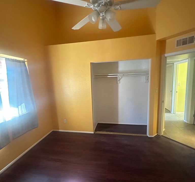 Bedroom1 with new flooring and fresh paint