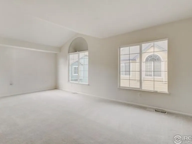 Large Primary Bedroom (not actual unit photo). *New carpet on stairs and in full upstairs.