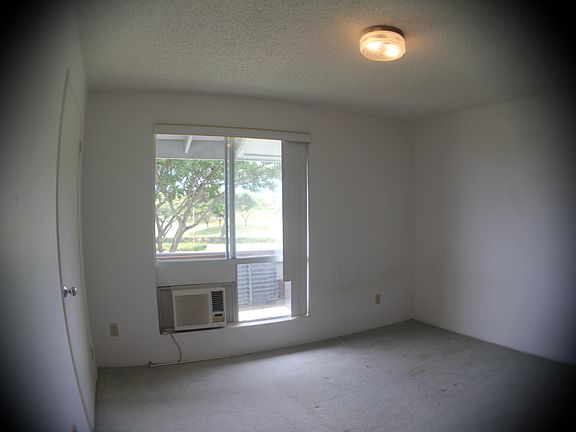 master bedroom with picture window