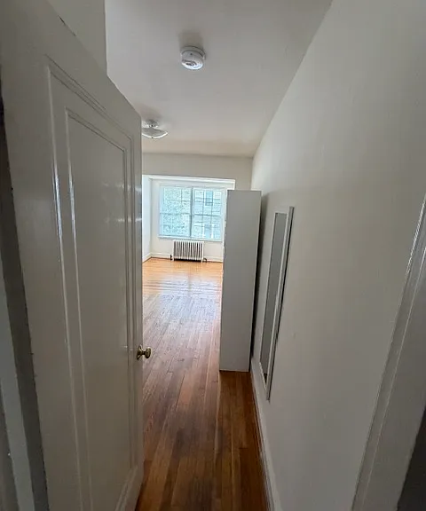 On the upper level are four bedrooms, two at front and two at rear, plus two bathrooms.