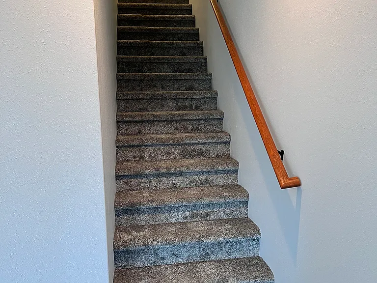 Stairway to bedroom over garage