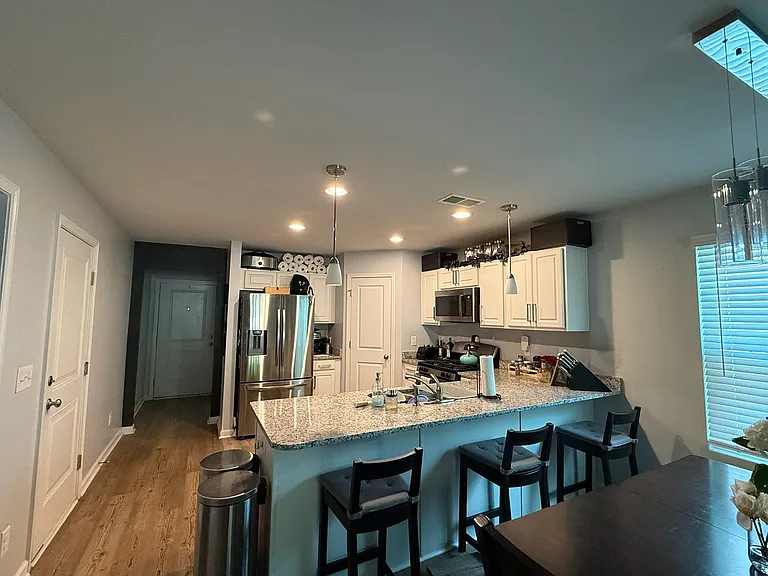 Front door and kitchen