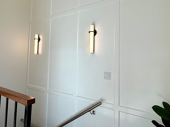 Gorgeous wood feature wall with vaulted ceilings and lots of natural light.