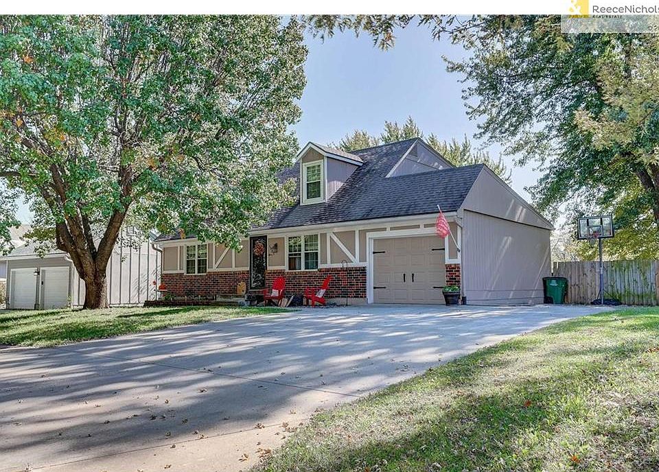Cute 1 1/2 story with ample parking and large fenced yard.
