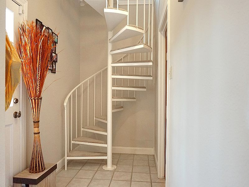 Stairs up to secondary suite