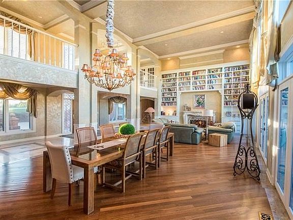 Great Room - 2-story, hardwood floors, separate dining and living spaces, elaborate trim carpentry.