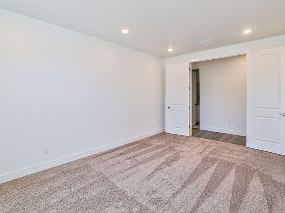 This space has been enhanced with double doors for added privacy.