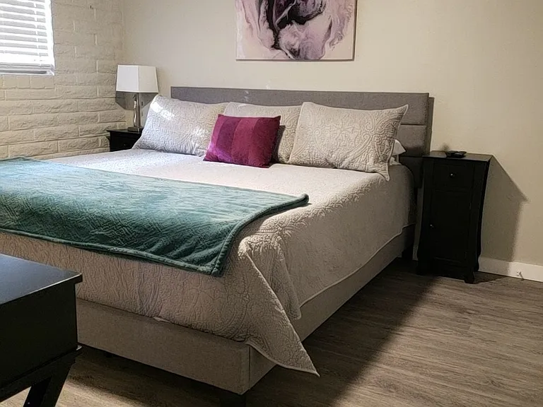 Spacious master bedroom with huge walk in closet and in suite half bath