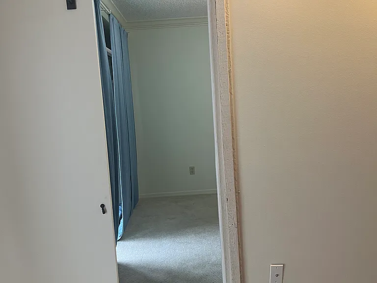 Living room access to Master bedroom office, (can be used as 3rd bedroom)