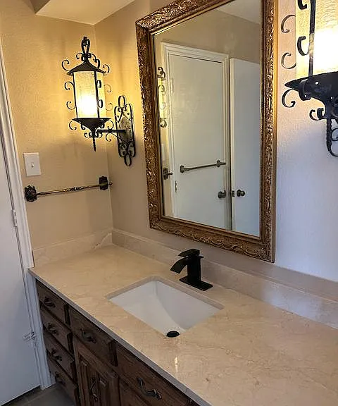 2nd vanity (of two) in master suite features new granite countertop and sink and fixture and ready access to walk-in closet