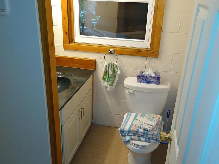 3'x3' shower, window opens with screen and insulating shade, towels are gone