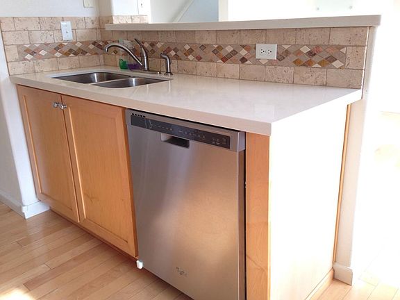 Quartz countertops, high end silent dishwasher