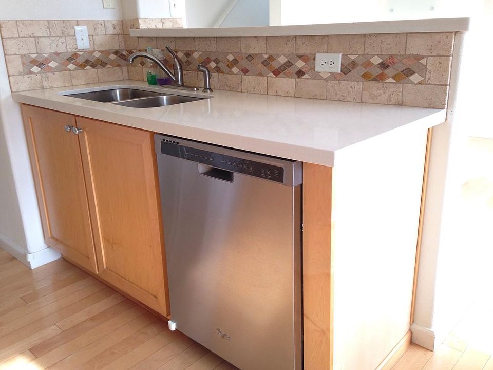 Quartz countertops, high end silent dishwasher