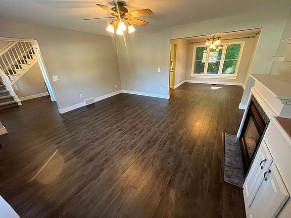 Large Living and sitting room. Many windows and natural light pours in!