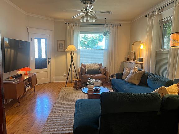 Living room. Furniture included: TV stand, curtains, and 8x10 rug (not the one in the photo)