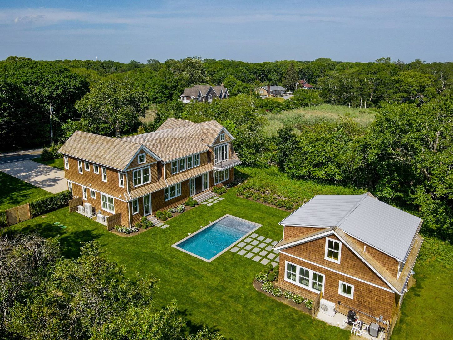   On shy 1.5 waterfront acres with Bay access  and rare  2 story 4 seasons Guest House!