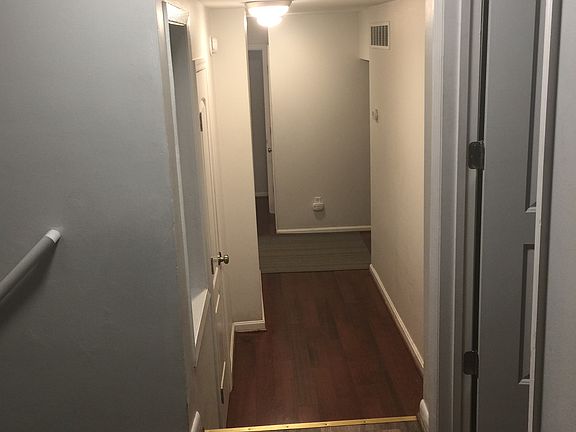 Split level hallway to rooms