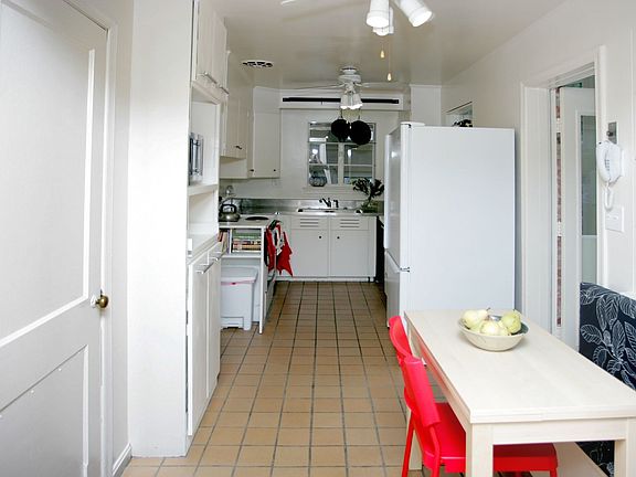 Kitchen seen from breakfast area